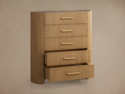 Astor Five-Drawer Dresser with oak wood reeding and natural stone top, featuring five horizontal drawers with stone pulls.