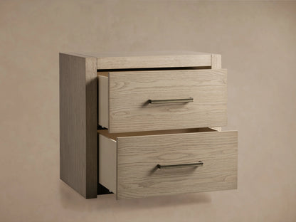 Bodhi Closed Nightstand, light wire-brushed white oak with satin sheen, two drawers partially open revealing champagne brass pulls.