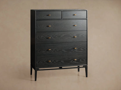 Brock Six-Drawer Dresser in dark ash wood with brushed brass handles. Two smaller top drawers, four larger drawers below, on tapered legs.