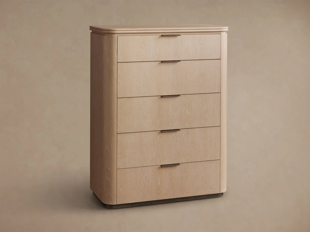 Front view of the Sand Caden Wood Five-Drawer Dresser, featuring oak veneer, rounded corners, and five drawers with pewter pulls.