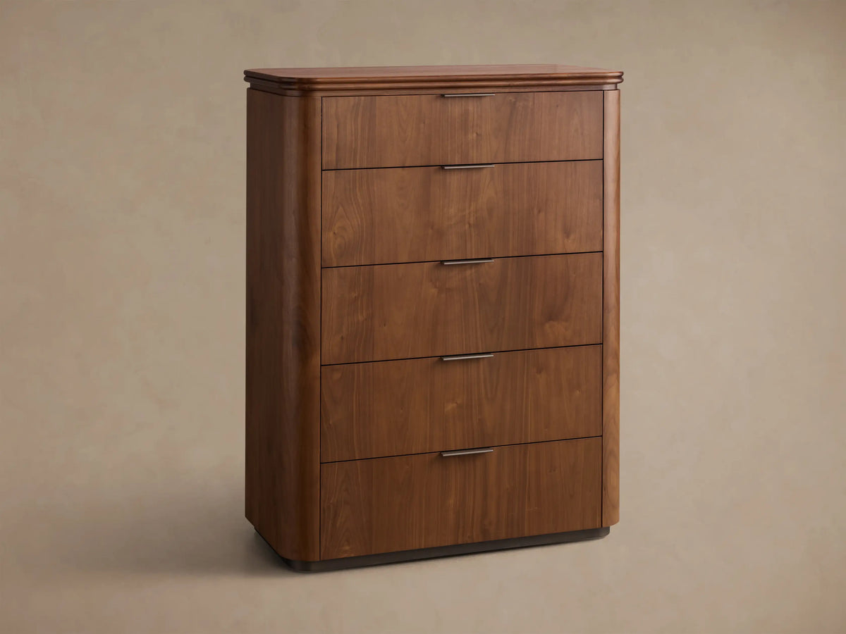 Front view of the walnut Caden Wood Five-Drawer Dresser with five drawers, antique bronze edge-pull hardware, and rounded edges.