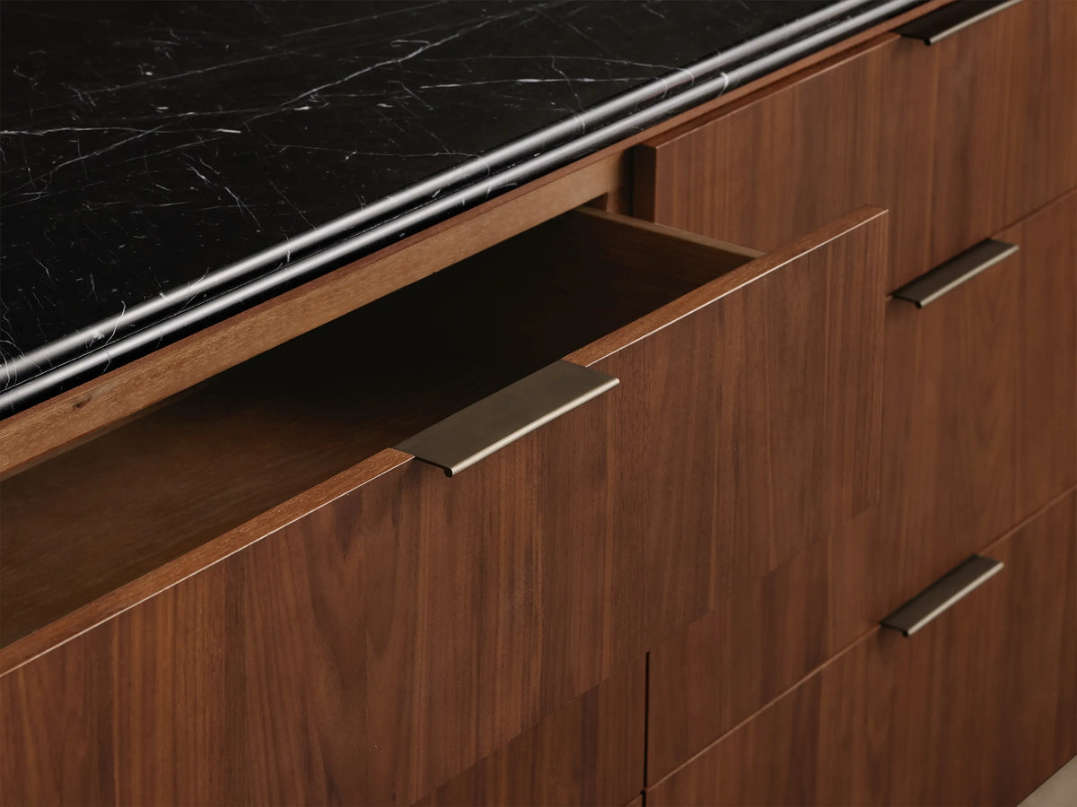 Caden Six-Drawer Dresser: Dark walnut veneer with black stone top, six drawers, and antique bronze edge-pulls.