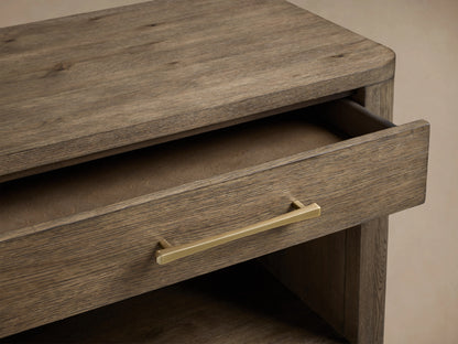 Calista Open Nightstand in veneered oak with a single drawer and open shelf, featuring a satin sheen and brass handle.