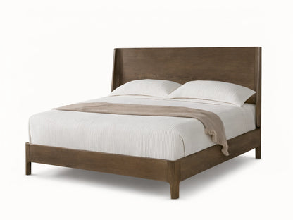 Calista Wood Bed with light brown veneered oak frame and high tapered headboard, dressed in white bedding & tan throw.