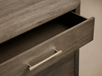 Calista chest with three drawers in dark veneered oak, featuring silver handles, shown with two drawers partially open.