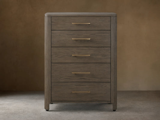 Calista Five-Drawer Dresser in dark veneered oak with gold hardware, soft-close glides, and a subtle satin sheen.