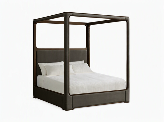 Conley Canopy Bed: dark oak wood frame, dark gray upholstered headboard & base, white bedding in a neutral room.