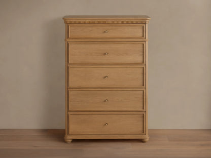 Carlisle Five-Drawer Dresser, light wood with visible grain, 5 drawers, small antique brass pulls, decorative reeding.