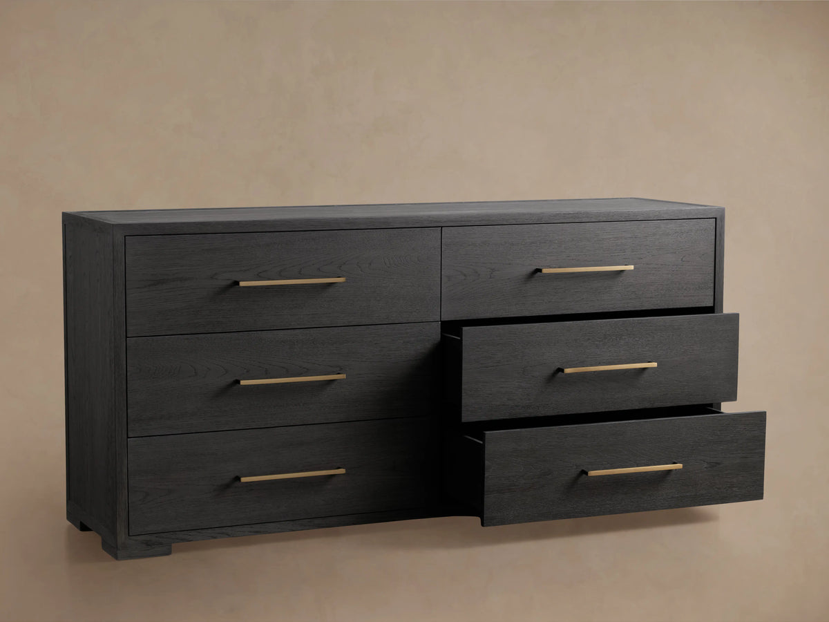 Darwyn Six-Drawer Dresser in dark oak finish, featuring six brass drawer pulls. Three drawers are open, showing smooth glides.