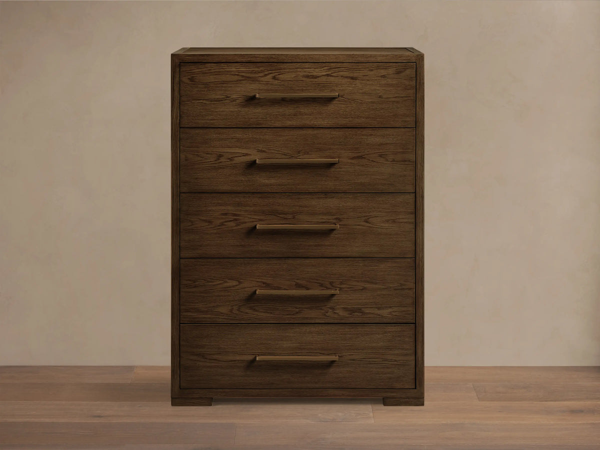 Front view of the dark brown Darien Five-Drawer Dresser, featuring five drawers with natural oak wood grain and brass pull handles.