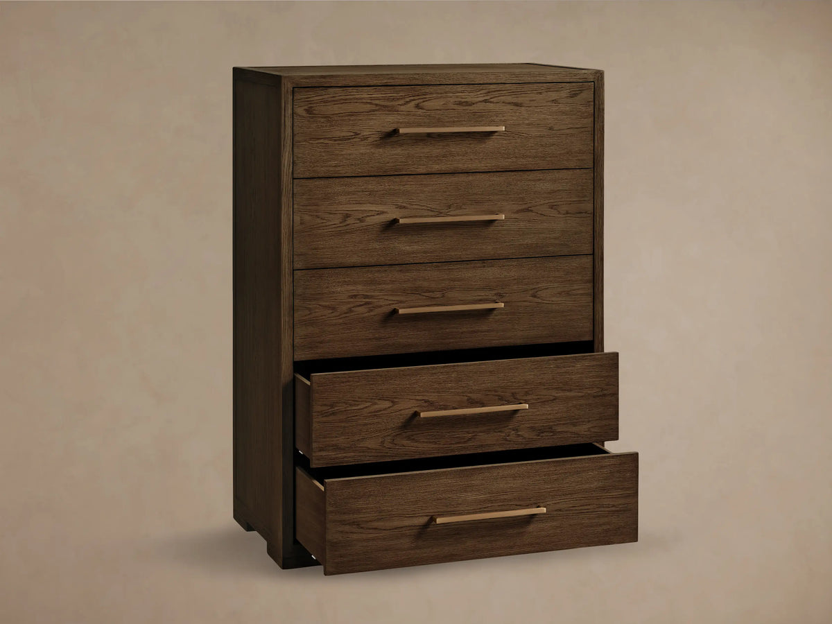 Close-up of the dark brown Darien Five-Drawer Dresser, top drawer closed, second drawer slightly open, with a brass pull.