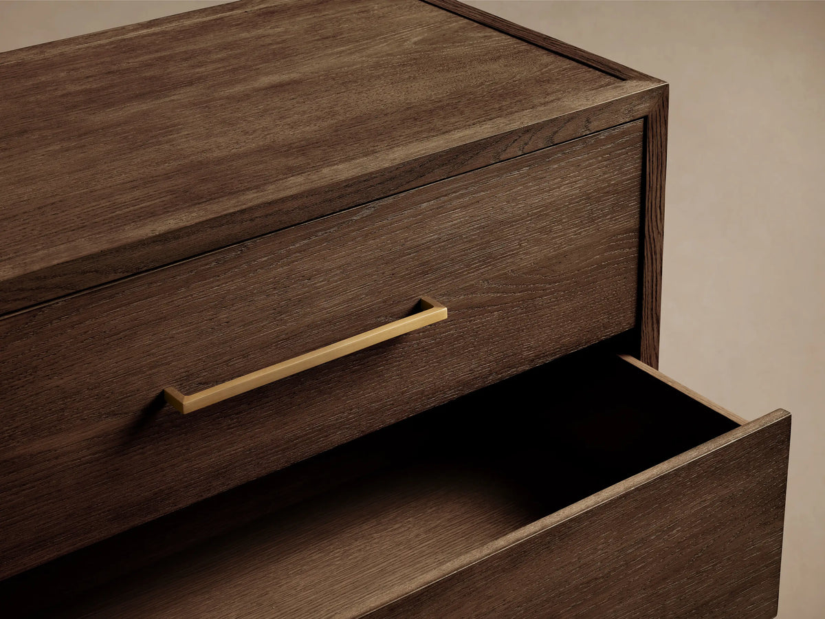 Front view of the dark brown Darien Six-Drawer Dresser with visible wood grain and six drawers featuring rectangular brass pulls.