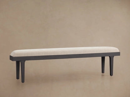 Oak Danny Bench with fawn finish, featuring a long, rectangular upholstered top and four sleek legs on a neutral background.