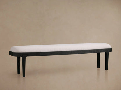 Danny Bench in oak wood with ebony finish. Upholstered in light fabric with black legs. Simple and elegant design.