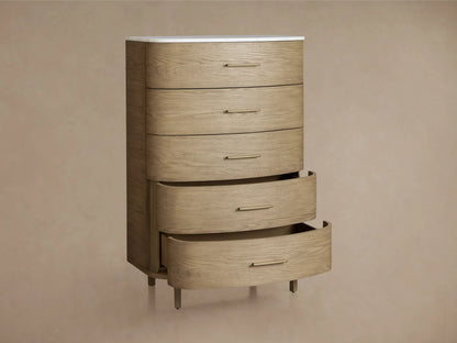 Danny Five-Drawer Dresser made of oak wood in a light fawn finish with brass pulls and a white marble top.