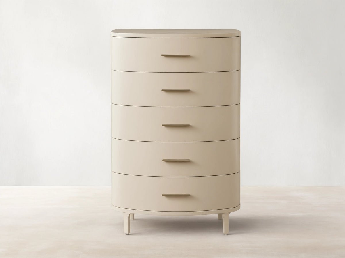 Danny Five-Drawer Dresser in Fumo: light cream finish, five drawers with horizontal brass pulls, rounded edges, on wood.