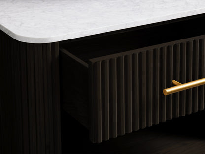 Finnley Open Nightstand with a white marble top, dark ribbed front, brass legs, and an open drawer with brass handle.