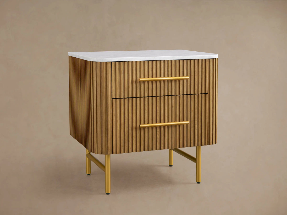 Mid-century style wooden nightstand with a white top, ribbed front, and yellow handles. It features two drawers and stands on yellow legs.