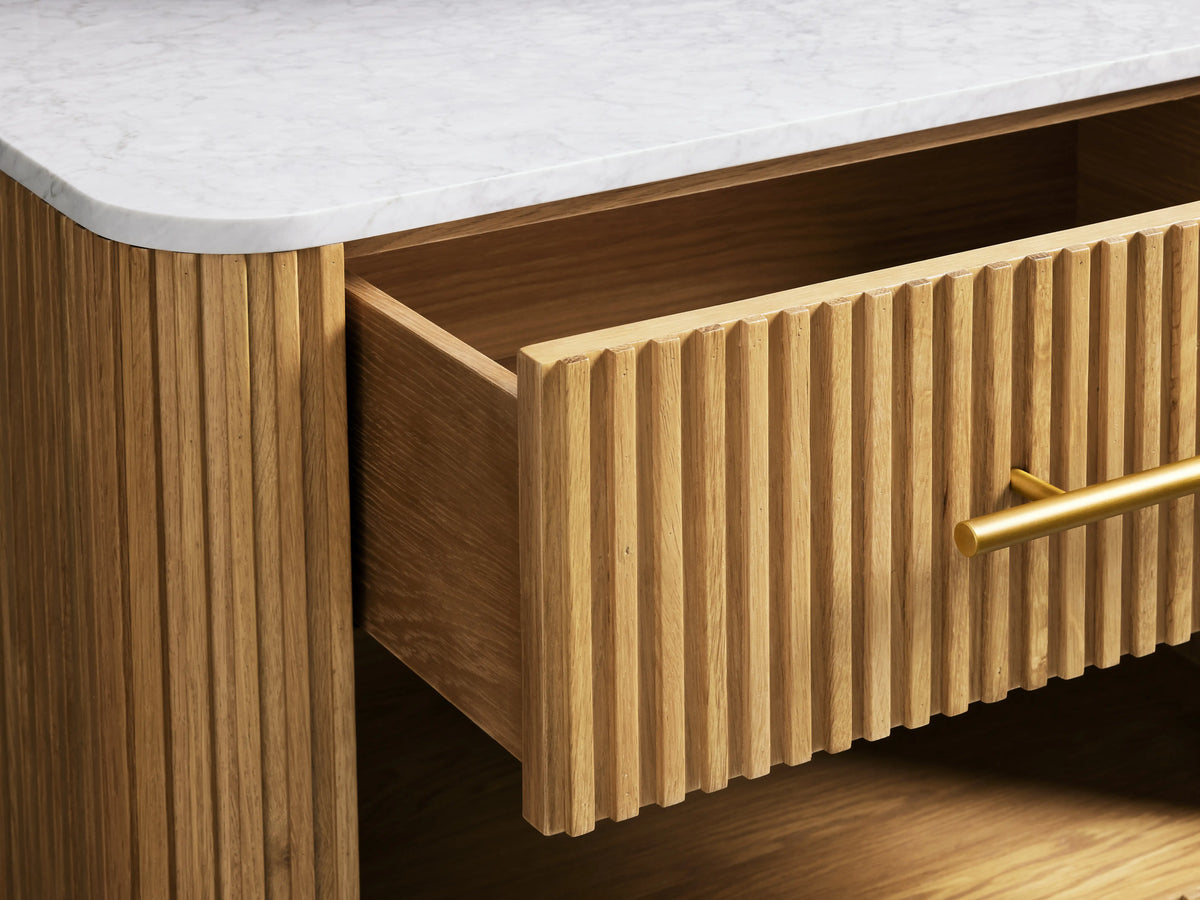 Finnley Open Nightstand with a honey finish, features oak wood grain, marble top, open shelf, and a brass-handled, open drawer.