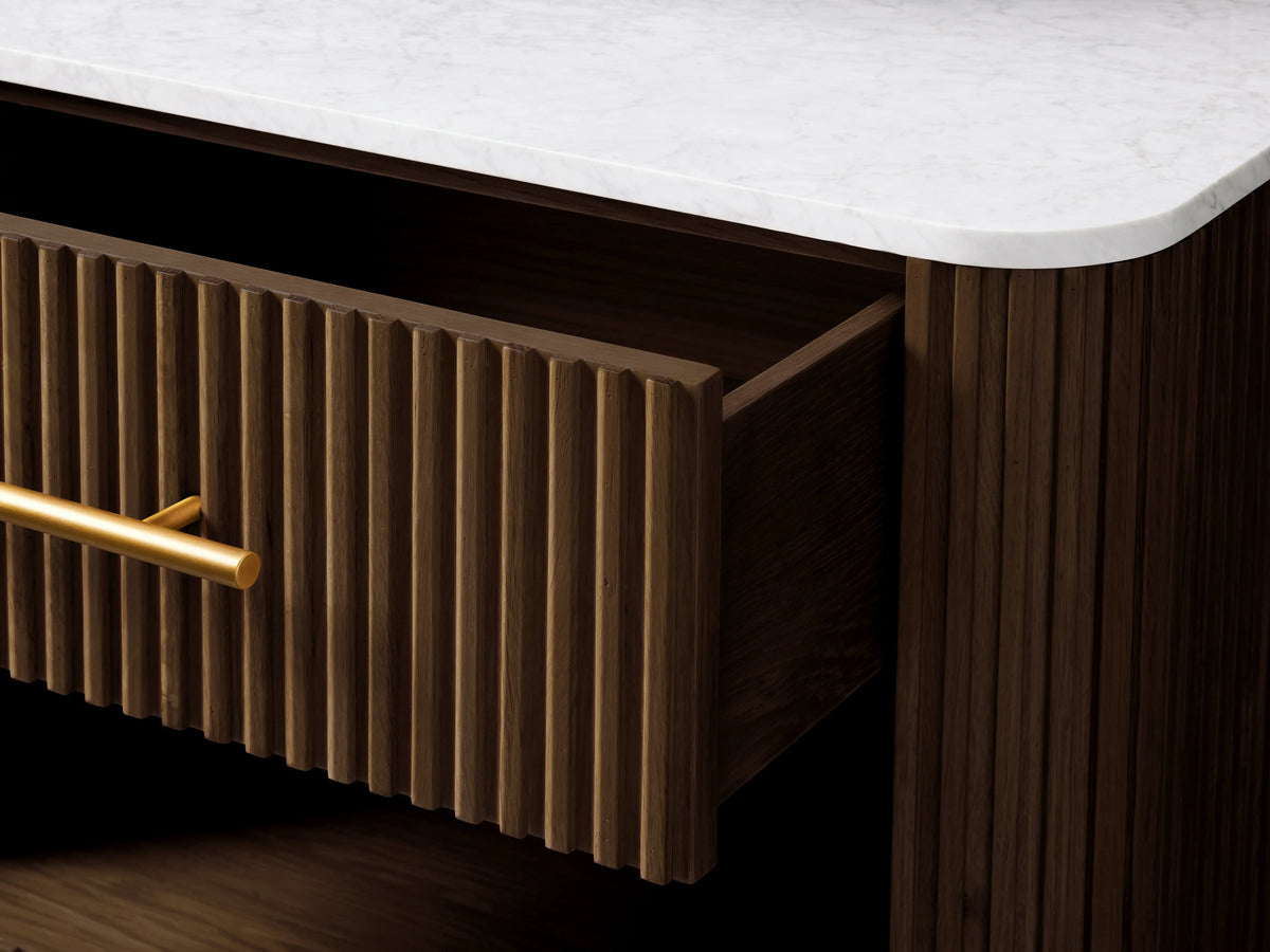 Finnley Open Nightstand with white marble top, ribbed dark wood finish, open shelf, brass handle, and legs, drawer open.