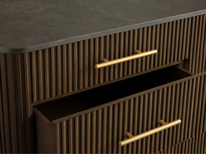 Finnley Nine-Drawer Dresser in dark wood with brass-finished handles; three drawers open, showcasing sleek design and a dark top surface.