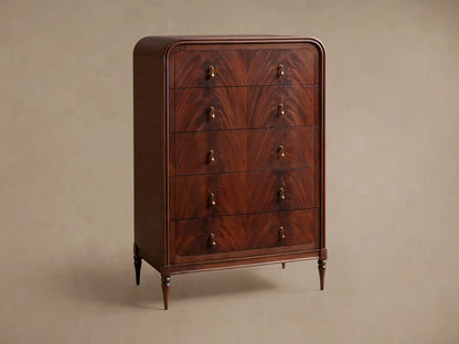 Frances Five-Drawer Dresser: Dark mahogany wood, rounded top, 5 stacked drawers, 10 brass pulls, on wooden floor.