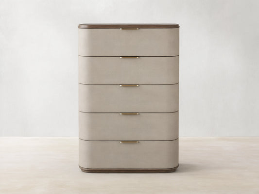 Harrow Five-Drawer Dresser with rounded, light beige faux shagreen drawers, dark wood top, and brass hardware.