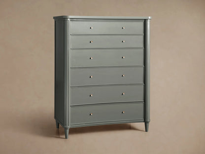 Henley Six-Drawer Dresser in smooth gray finish with petite brass pulls, featuring a classic rectangular silhouette and tapered legs.