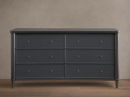 Front view of the Charcoal Henley Wide Six-Drawer Dresser, featuring six drawers with petite brass pulls.