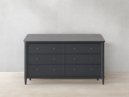 Front view of the Charcoal Henley Wide Six-Drawer Dresser, featuring six drawers with petite brass pulls.