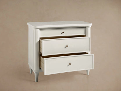 Henley Nightstand in white with smooth finish, featuring a brass knob and an open drawer showing light wood interior.