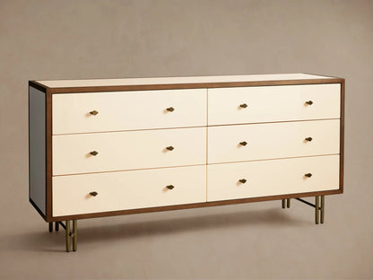 Henton Six-Drawer Dresser with cream drawers, dark wood frame, brass knobs, and brass-finished tubular legs.