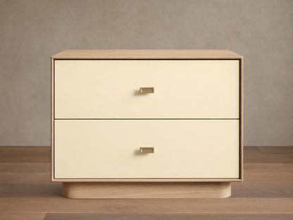 Front view of the Oak Lowen Nightstand, featuring two parchment faux leather drawers with champagne brass pulls.
