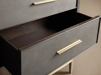 Dark wood Malone dresser, 11 gray shagreen leather drawers with brass bar pulls, on a gold metal base.