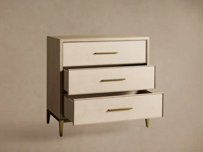 Malone Three-Drawer Chest in bone/manta, elm wood veneer frame, cream textured shagreen leather drawers, gold pulls & base.