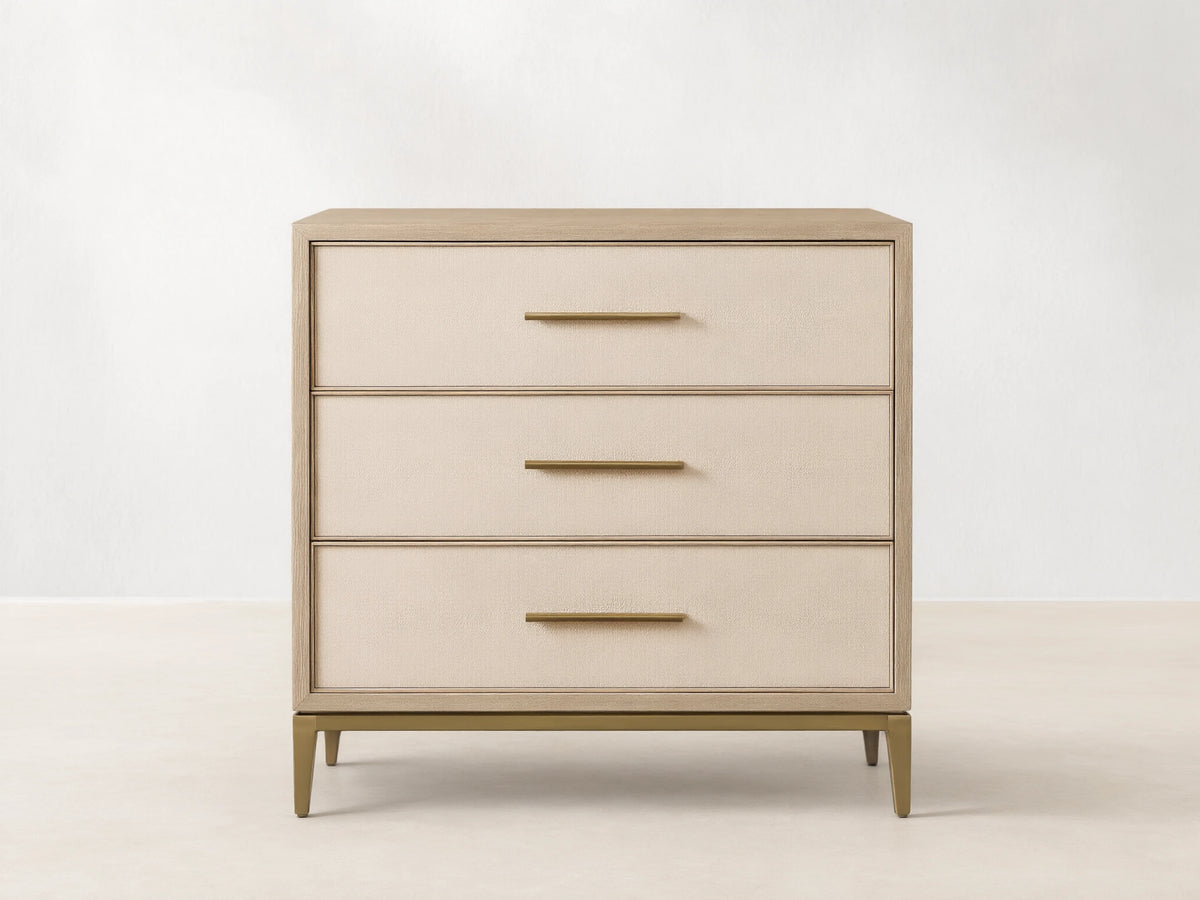 Malone Three-Drawer Chest in bone/manta, elm wood veneer frame, cream textured shagreen leather drawers, gold pulls & base.