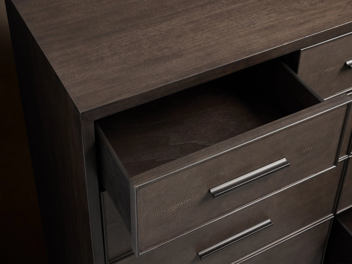 Malone Eleven-Drawer Dresser in dark wood finish, showing open top drawer with textured leather insets and metallic handles.
