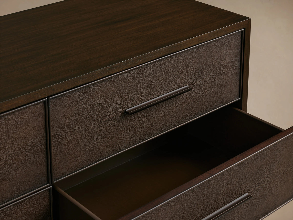 Malone Nine-Drawer Dresser in dark wood with a smooth finish, featuring three rows of three drawers each with minimalist handles.