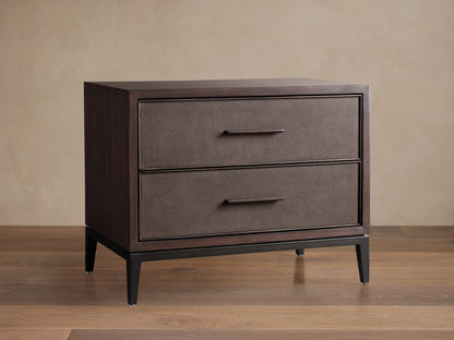 Malone Closed Nightstand with two drawers, dark wood finish, textured leather fronts, and sleek black handles; stands on tapered legs.