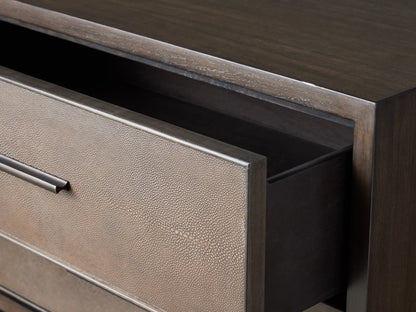 Malone Closed Nightstand with two drawers, dark wood frame, textured reconstituted leather insets, and metallic handles, on wooden floor.