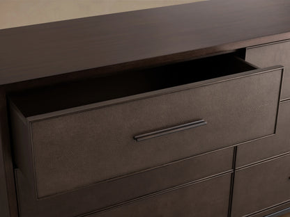 Malone Six-Drawer Dresser in dark wood finish with six drawers, each featuring sleek dark handles, on tapered legs against a neutral backdrop.