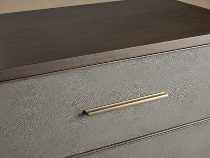 Malone Three-Drawer Chest with dark wood frame, gray leather insets, and brass handles and legs on a beige background.