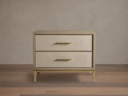 Front view of the Bone Malone Closed Nightstand with two cream shagreen leather drawers and brass hardware.
