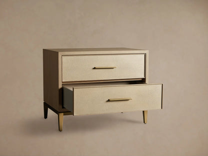 Front-right view of Bone Malone Closed Nightstand, with light oak frame and two shagreen leather drawers, one open, on metallic legs.