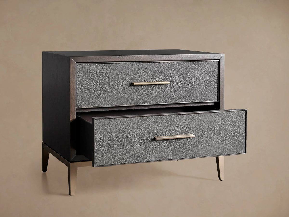 Malone Closed Nightstand with two drawers featuring a dark wood frame, gray reconstituted leather fronts with shagreen texture, and metallic handles.