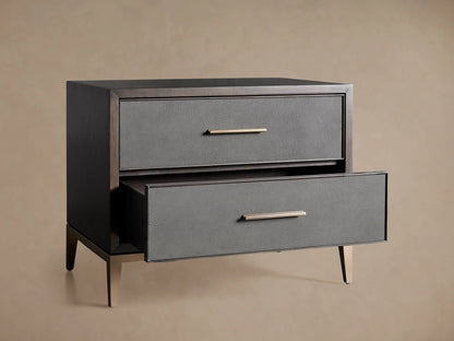 Malone Closed Nightstand with two drawers featuring a dark wood frame, gray reconstituted leather fronts with shagreen texture, and metallic handles.