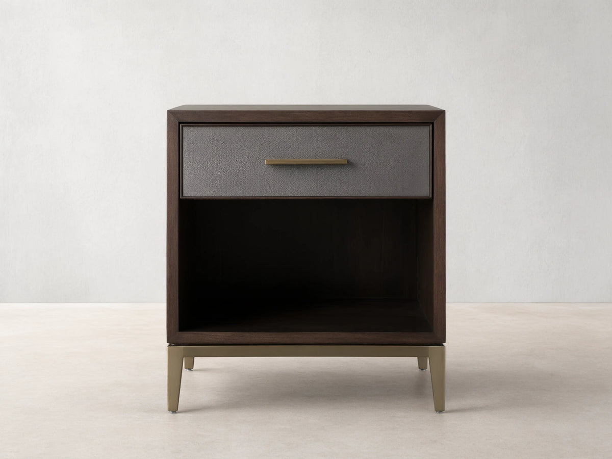 Malone Open Nightstand with dark wood finish, single drawer with reconstituted leather inset, metallic handle, open lower shelf, and metallic legs.
