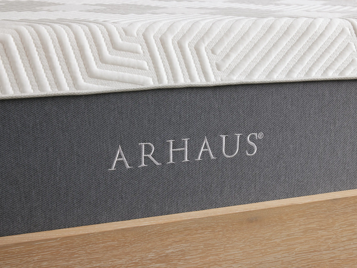 Memory Foam Firm Mattress on wooden platform; features white zigzag-patterned cover and gray base, showcasing 12" height.