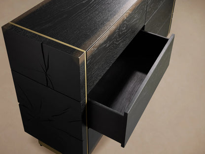 Mihaela Six-Drawer Dresser in dark oak with one drawer open, showing hand-carved detailing and brass-like accents.