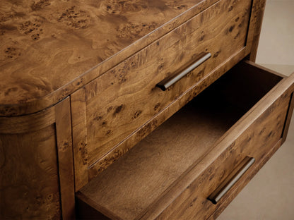 Front view of the Mogadore Nightstand, crafted from mappa burl wood with two drawers and antiqued brass-finished hardware.